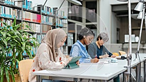 Group of multiethnic students in a library