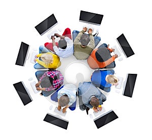 Multiethnic People Using Computers in a Circular Position