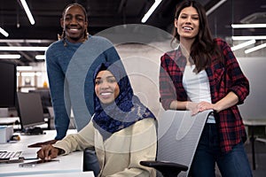 Multiethnics team of software developers working together