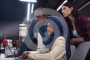 Multiethnics team of software developers working together