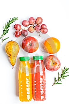 Multifruit drink in plastic bottle on white background top view mock-up