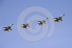 Multifunctional fighter-bombers Su-34 during the parade, fly in the sky over Red Square.