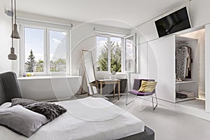 Multifunctional modern bedroom with bathroom