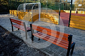 multifunctional outdoor playground for ball games at school. green artificial turf