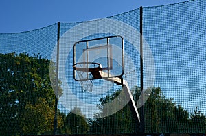 Multifunctional outdoor playground for ball games at school. green artificial turf from a plastic carpet with lines. basketball ho