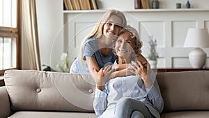 Multigenerational family relatives women posing for camera