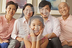 Multigenerational family smiling, portrait