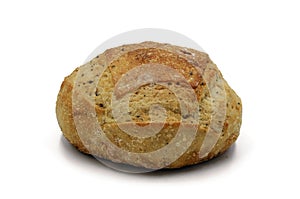 Multigrain bread loaf on white background