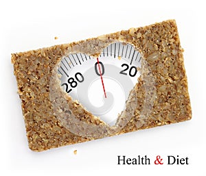 Multigrain slice of bread as weighing scale photo