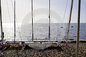 Multihull trimaran charter school boats on the sandy beach in Cap Ferret in arcachon basin bay