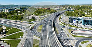 Multilevel city highway crossroad with viaducts, tunnel and rotary