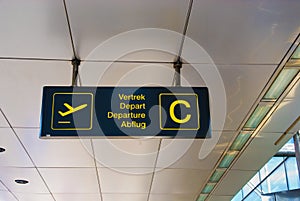 Multilingual Airport Departure Sign