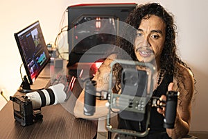 Multimedia Equipment Management. content creator immersed in his studio