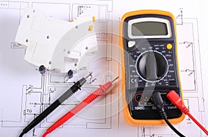 Multimeter and electric fuse on construction drawing