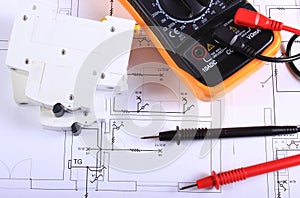 Multimeter and electric fuse on construction drawing