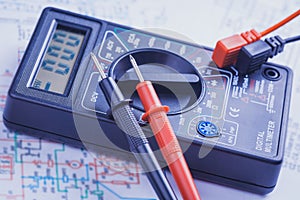 Multimeter on the electrical circuit. close-up