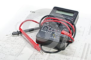 Multimeter and electronic schematics photo