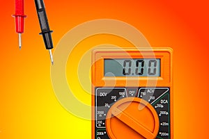 Multimeter on gradient yellow orange background