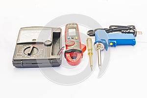 The multimeters, clamp meter, soldering iron, screwdrivers fire check, with the white copy space background