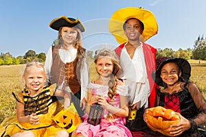 Multinational kids in Halloween costumes