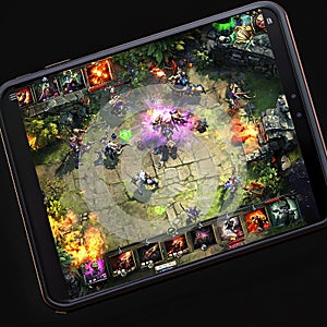 A multiplayer mobile MOBA game with a colorful team-based battle arena. photo