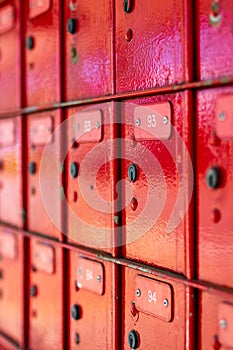 Multiple angled red new zealand post boxes