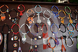 Multiple beed necklaces on display