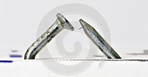 Multiple bent silvery nail #2