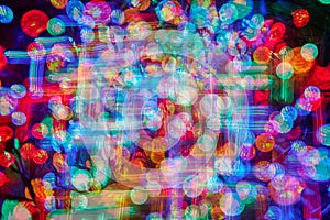 Multiple bright coloured Christmas lights. Intentional Camera Movement (ICM)