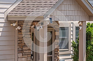 Multiple cameras and sensors securing front door of home