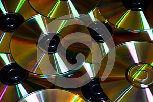 Multiple CD or DVD discs closeup details
