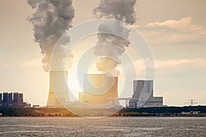 Multiple Coal Fossil Fuel Power Plant Smokestacks Emit Carbon Di