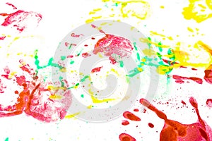 Multiple colored hand prints on a white background