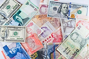 Multiple Currencies banknotes as colorful background