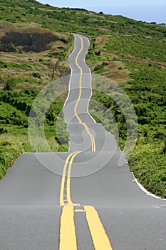 MULTIPLE CURVES IN THIS ROAD GOING UP A MOUNTAIN