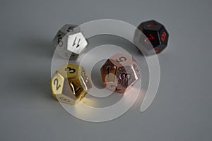 Multiple d12 twelve sided dice die copper silver gold black