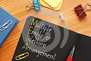 Multiple Employer Welfare Arrangement MEWA is shown on the conceptual photo