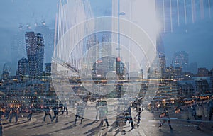 Multiple exposure of city commuters and skyscrapers in London photo