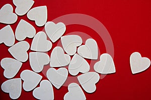 Multiple foamy white heart shapes as red background Valentine's photo