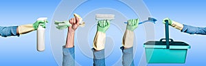 Multiple hands holding different tools for housekeeping banner. Spring cleaning concept