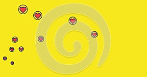 Multiple heart icons moving against yellow background
