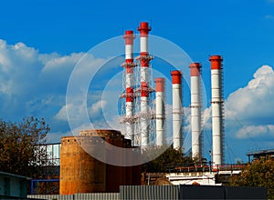 Multiple industrial chimneys industrial ecology background