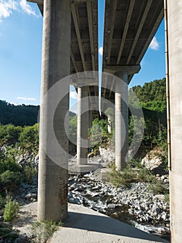Multiple Lane Highway  bridge with reinforced concrete columns over a river