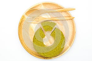 Multiple layers green tea cake on wooden disk