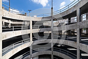 A multiple level circular parking garage ramp.