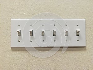 Multiple Light Switches Grouped Together photo