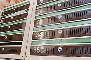 Multiple Mailboxes in Apartment Building â Symbol of Growing Housing Market and High Property Prices photo