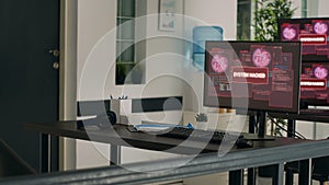 Multiple monitors displaying computer malfunction and security breach