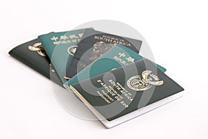 Multiple passports on white background
