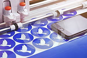multiple round peace dove stickers are made by a plotting machine from blue adhesive film